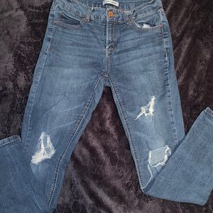 High-Waisted Ripped Jeans